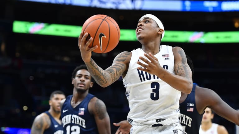 Arizona's Miller: Transfer James Akinjo is PG 'you love to have'